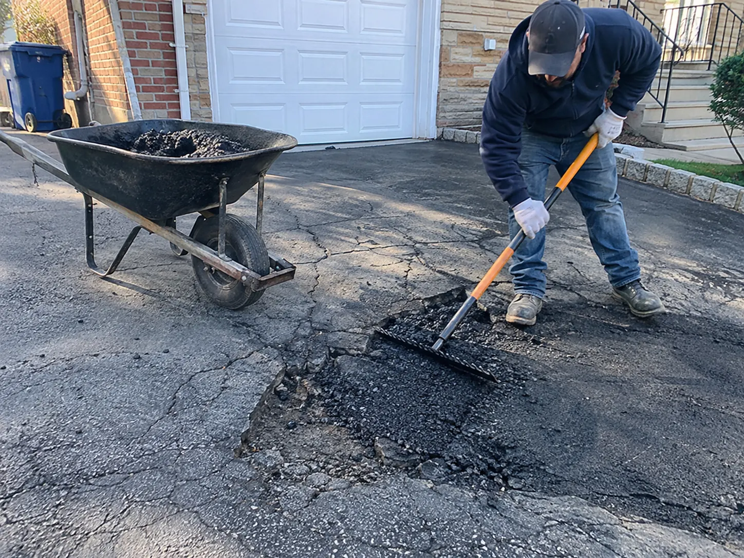 Asphalt driveway repair for cracked and damaged pavement in NYC