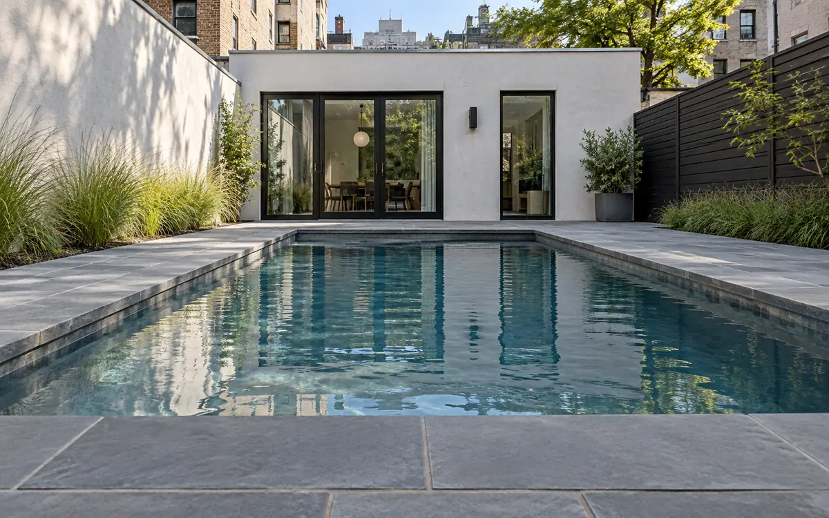 Thermal bluestone surrounding a compact residential pool