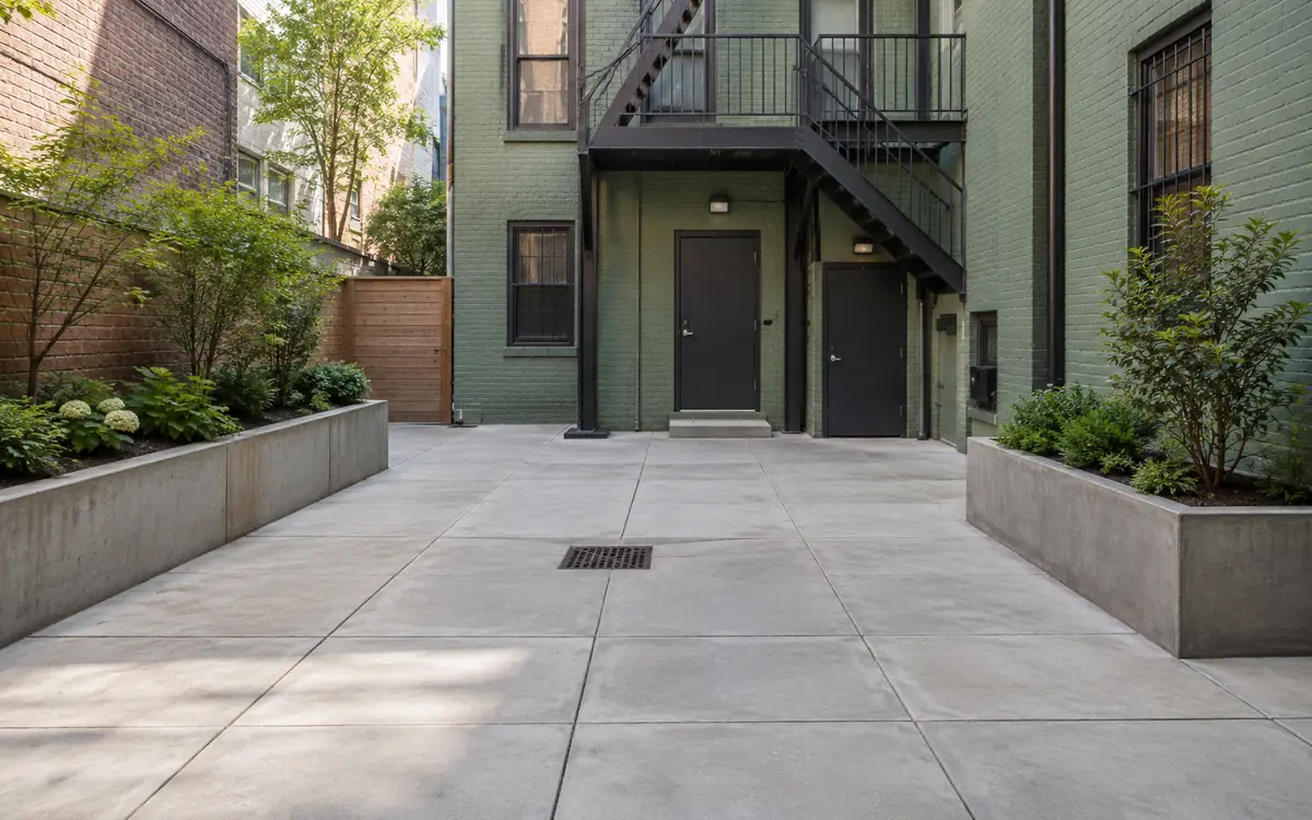 Concrete courtyard at an NYC mixed-use property