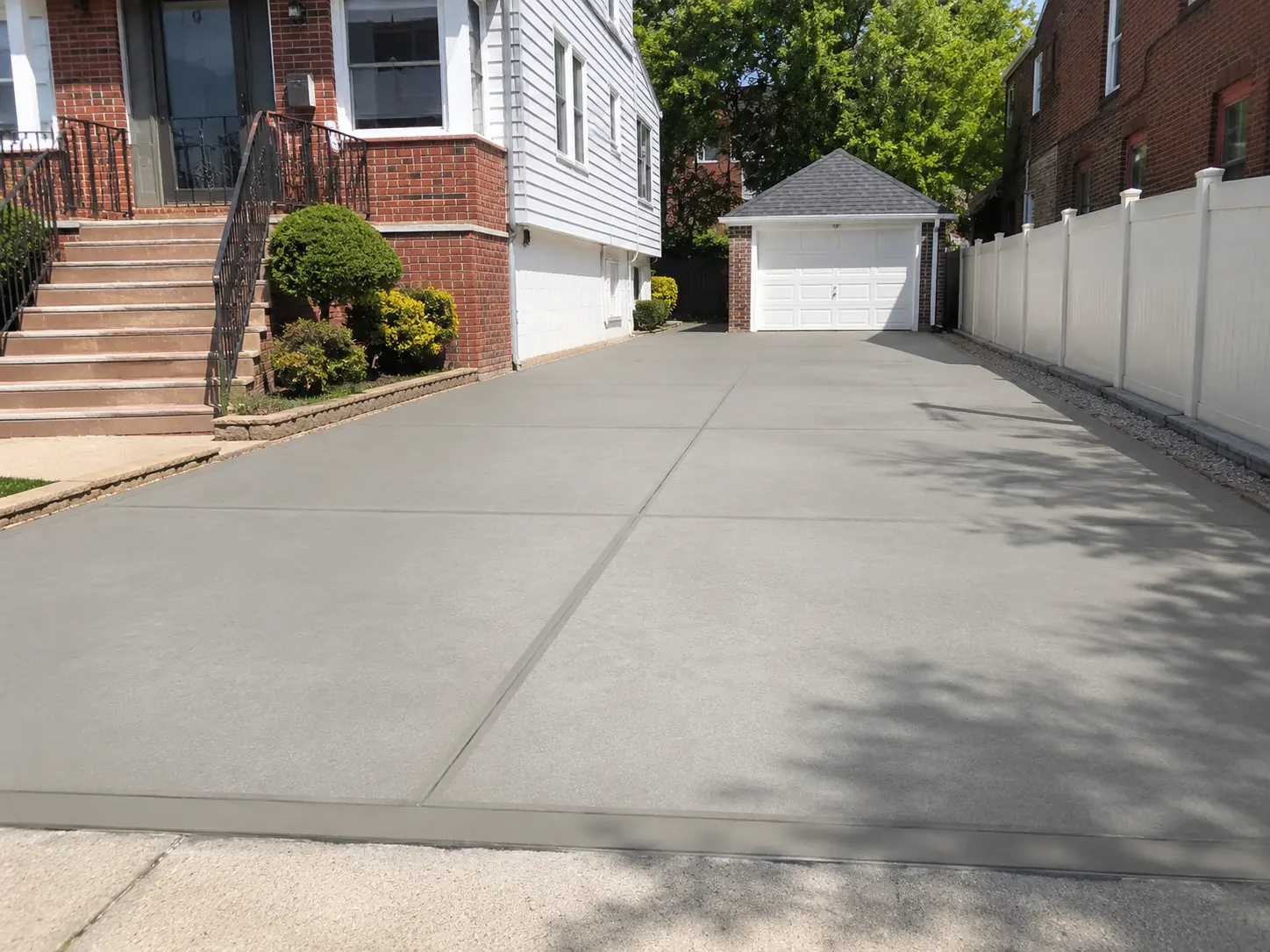 New concrete driveway installation at an NYC residential property