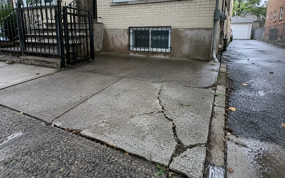 Severely cracked concrete pavement showing structural surface damage