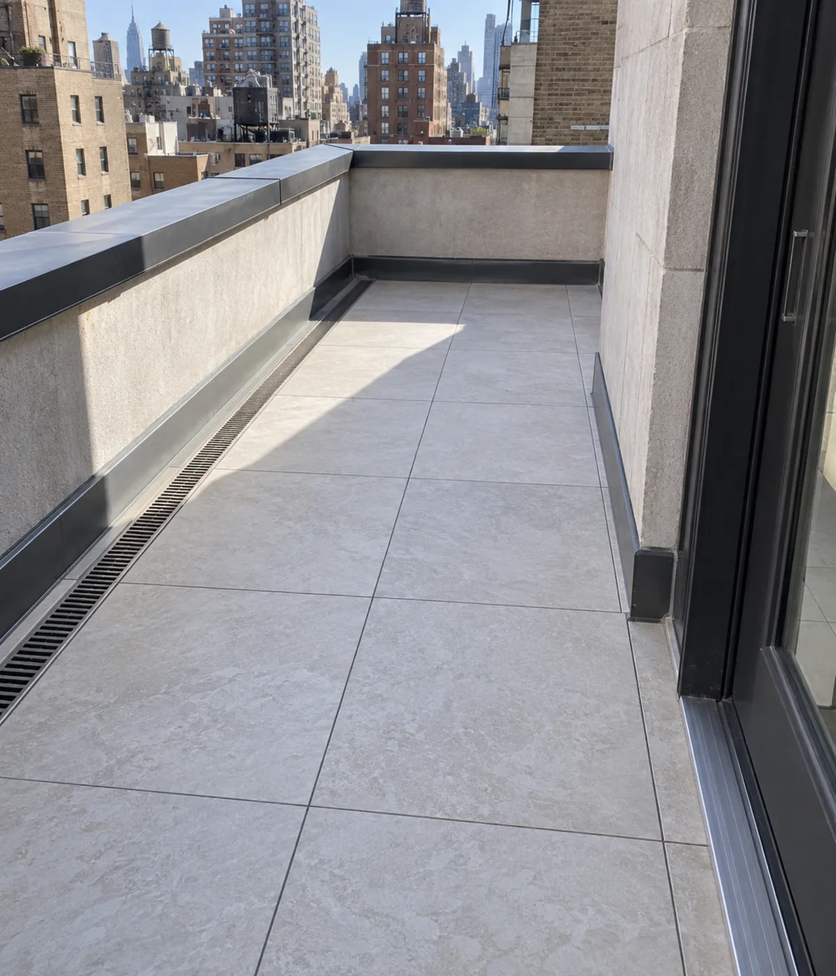 Exterior tile terrace installation at an NYC property