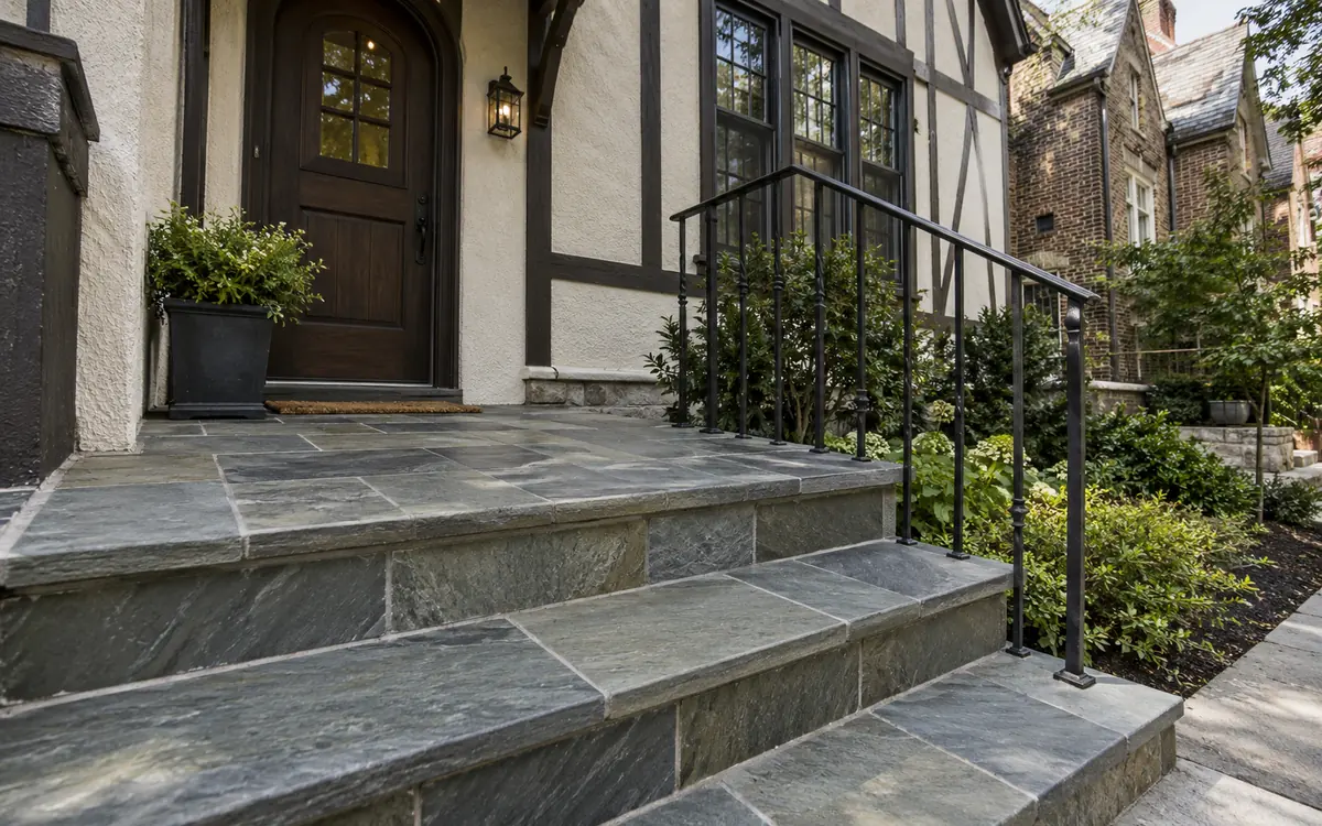 Muted slate exterior tile at a Tudor-style city entrance