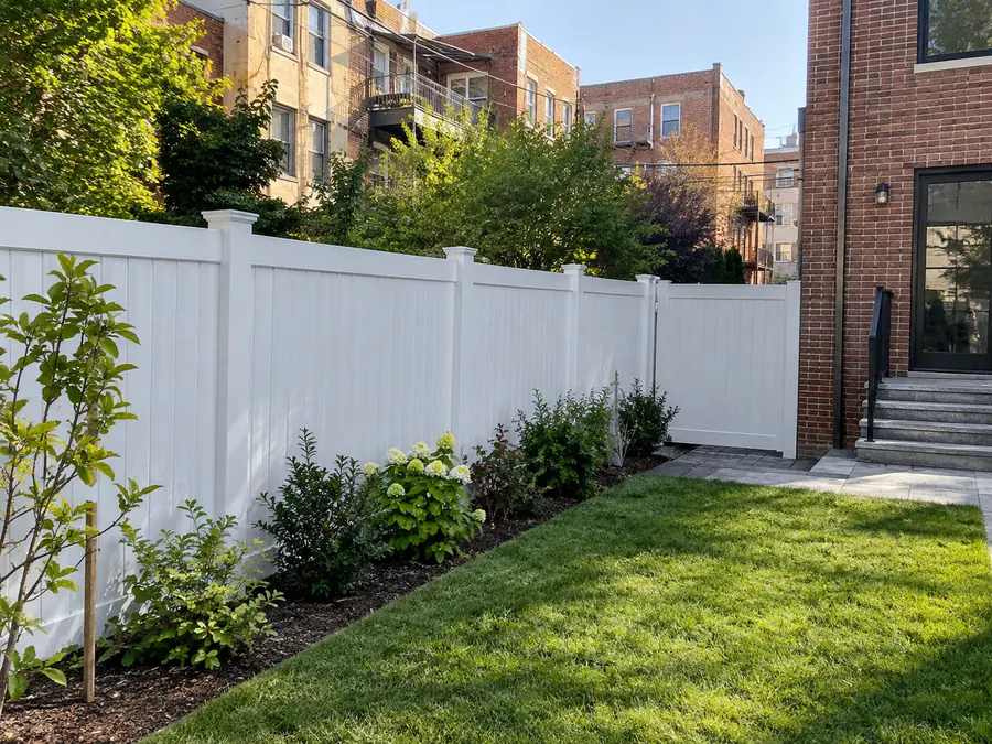 Privacy fence installation at a New York City residential backyard